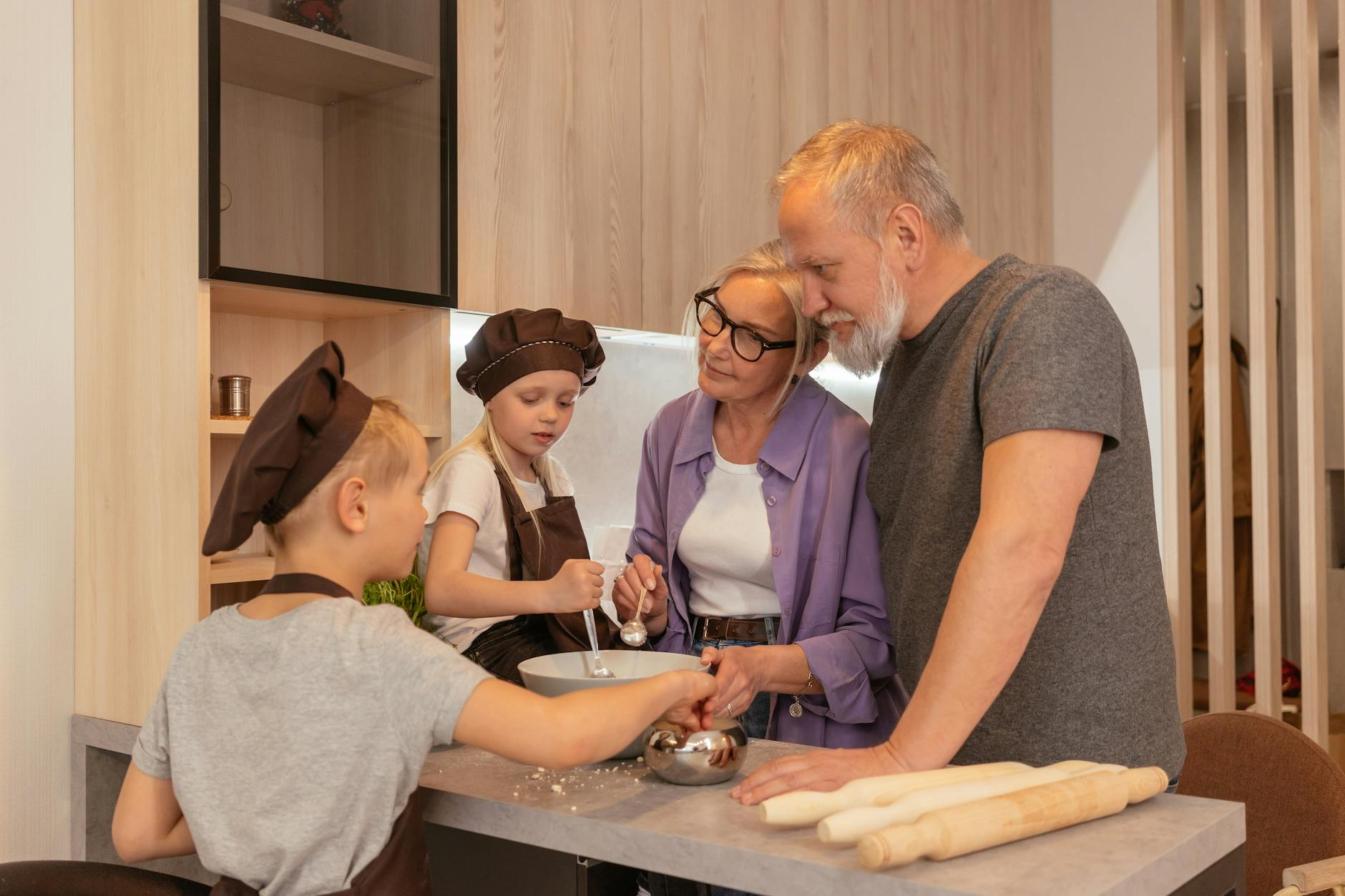 chef teaching couple cooking