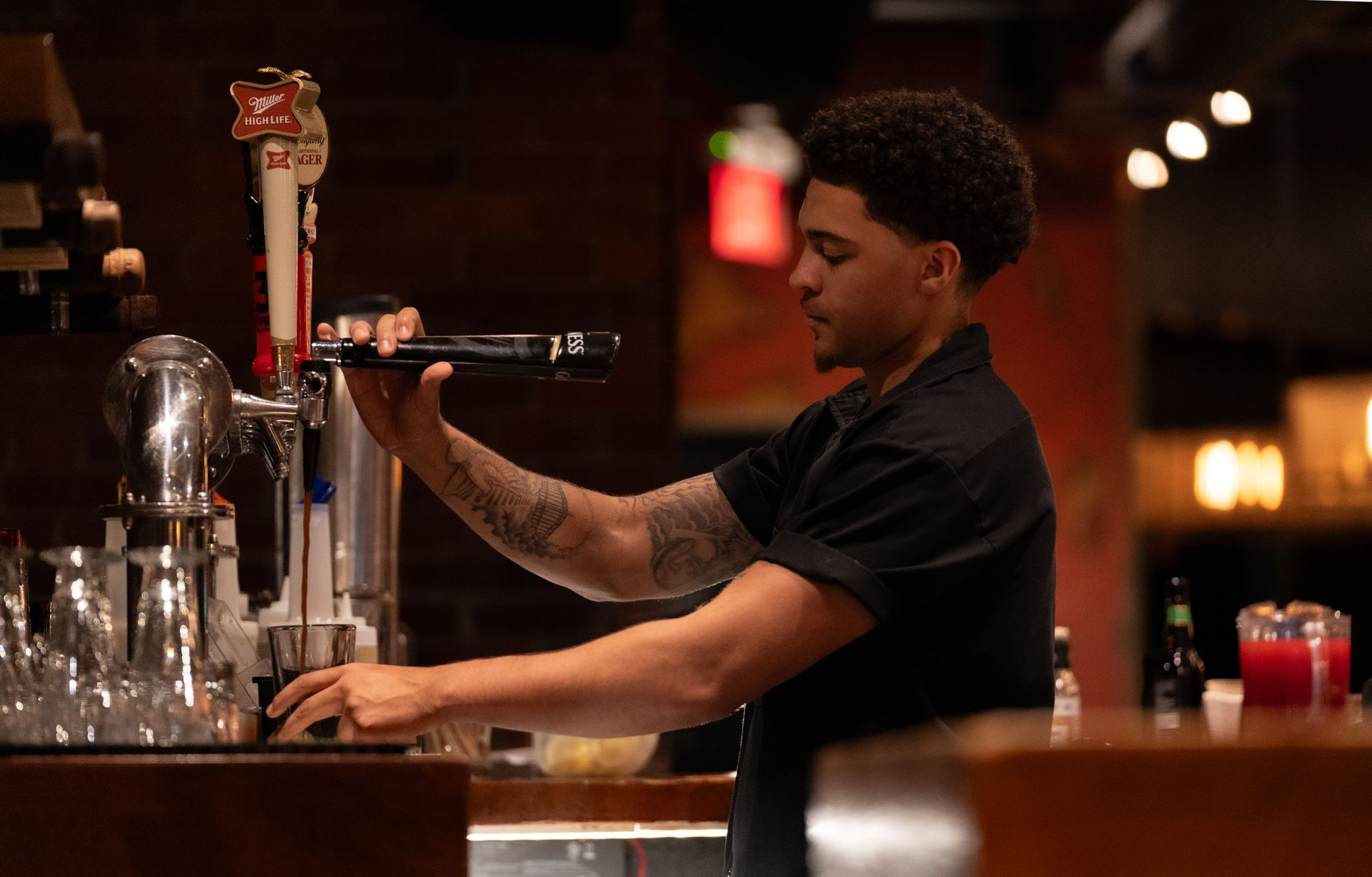 beer cocktail bartender pouring