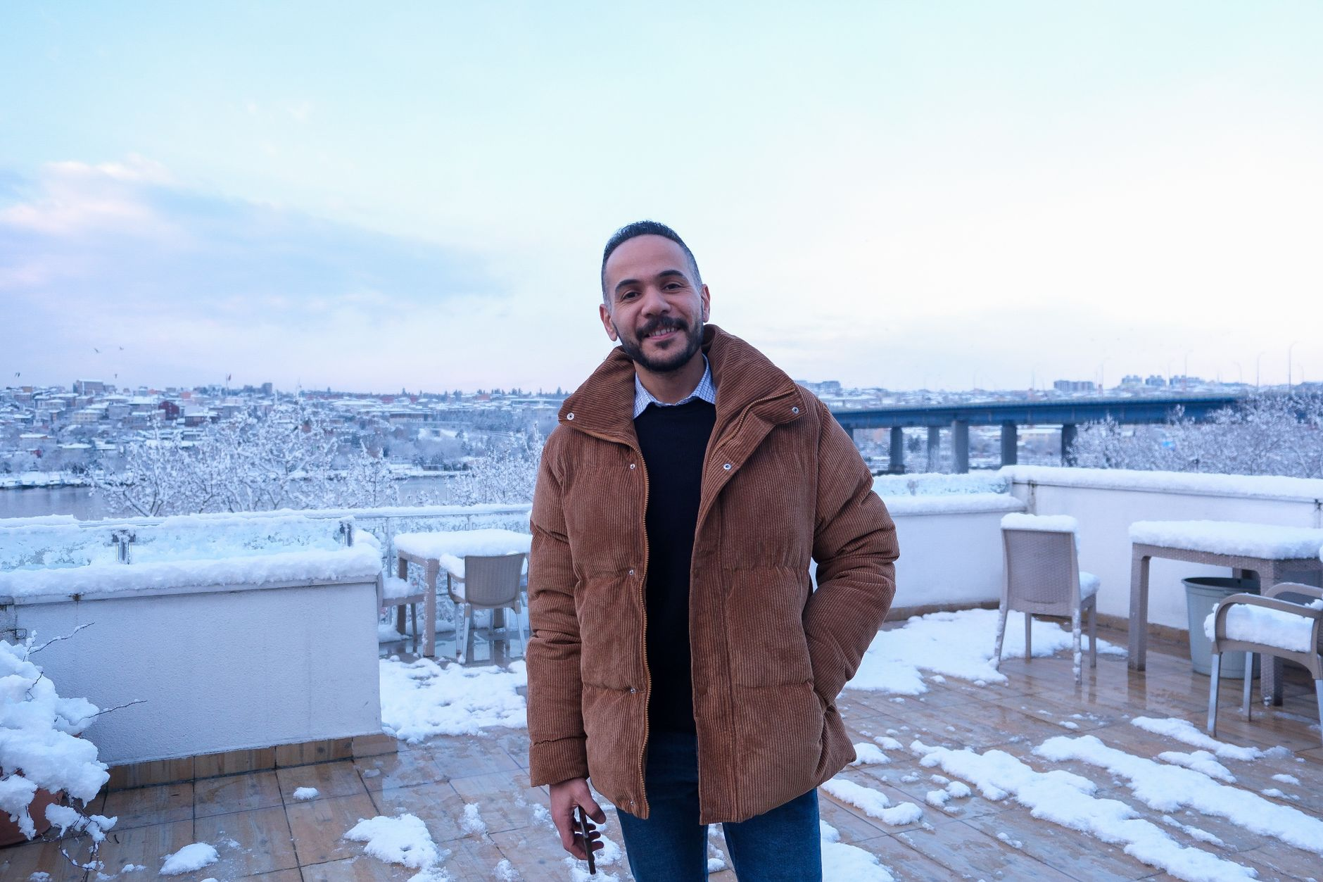 winter rooftop drink snow